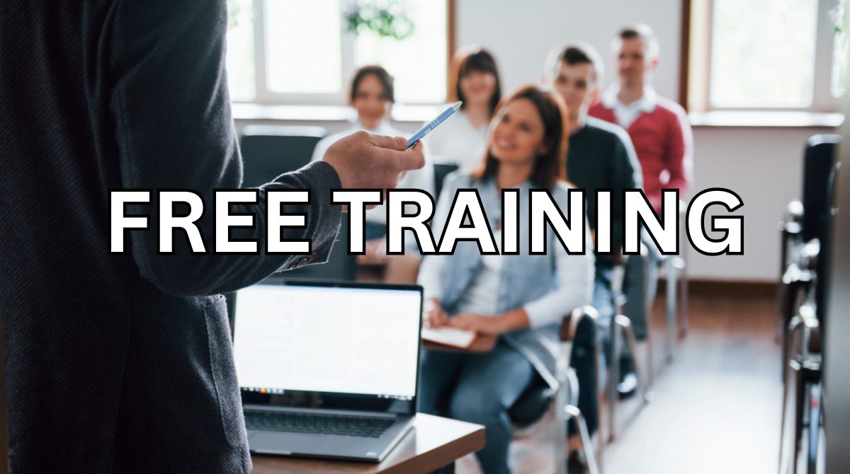 An image of a man holding a pen delivering a training class, overlaid with the text 'Free Training'.